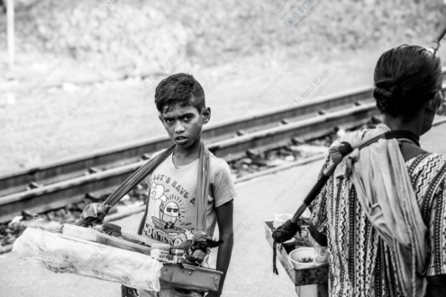 Young Vendor by the Railway Tracks - Fine Art Photography Print, Limited Edition Photography, Black and White Photography, Art Photography for Sale, Collector Photography