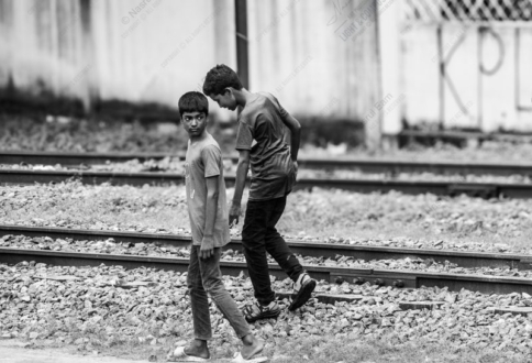 Two Boys on the Railway Line - documentary photography, fine art photography, visual storytelling, photography books, photo composition, narrative photography