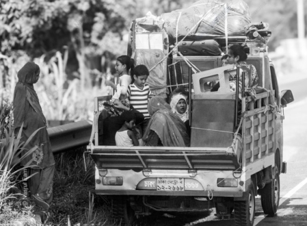 A Family's Departure from the Roadside - photography, visual storytelling, fine art photography, documentary photography, human condition