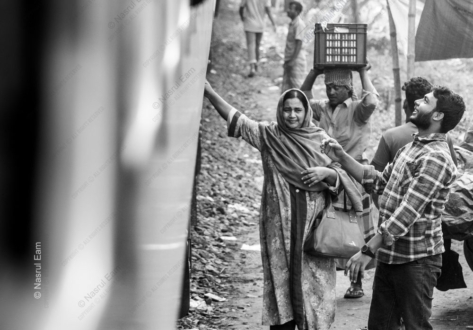 A Woman and a Young Man at the Trainside