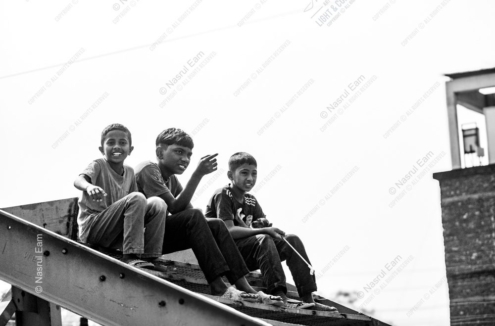 Three Boys on a Sunlit Girder