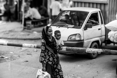 Woman and Child at the Crossing Gate