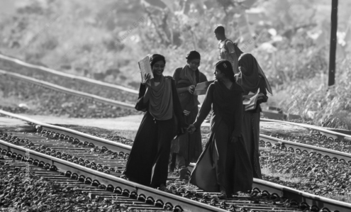 Girls with Books on the Railway Tracks