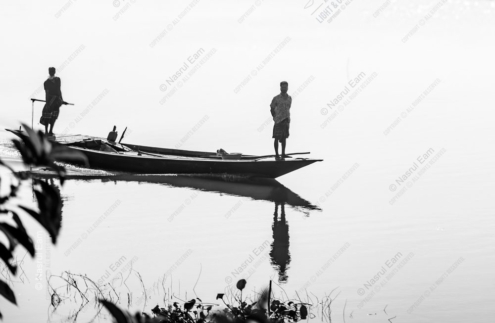 Two Figures on a Still River