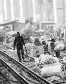 A Family Along the Tracks
