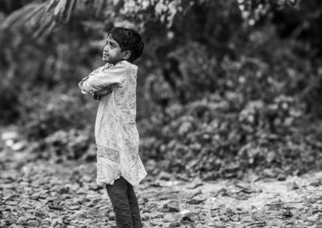 Young Boy on Stony Ground