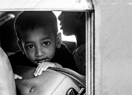 Young Traveler by the Window