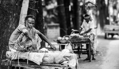 The Vendor's Watch by the Roadside Tree