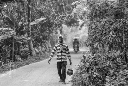 Carrying a Traditional Clay Pot